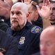 Illustration for article titled Every Member Of Police Department Excitedly Volunteers To Go Undercover In White Supremacist Group